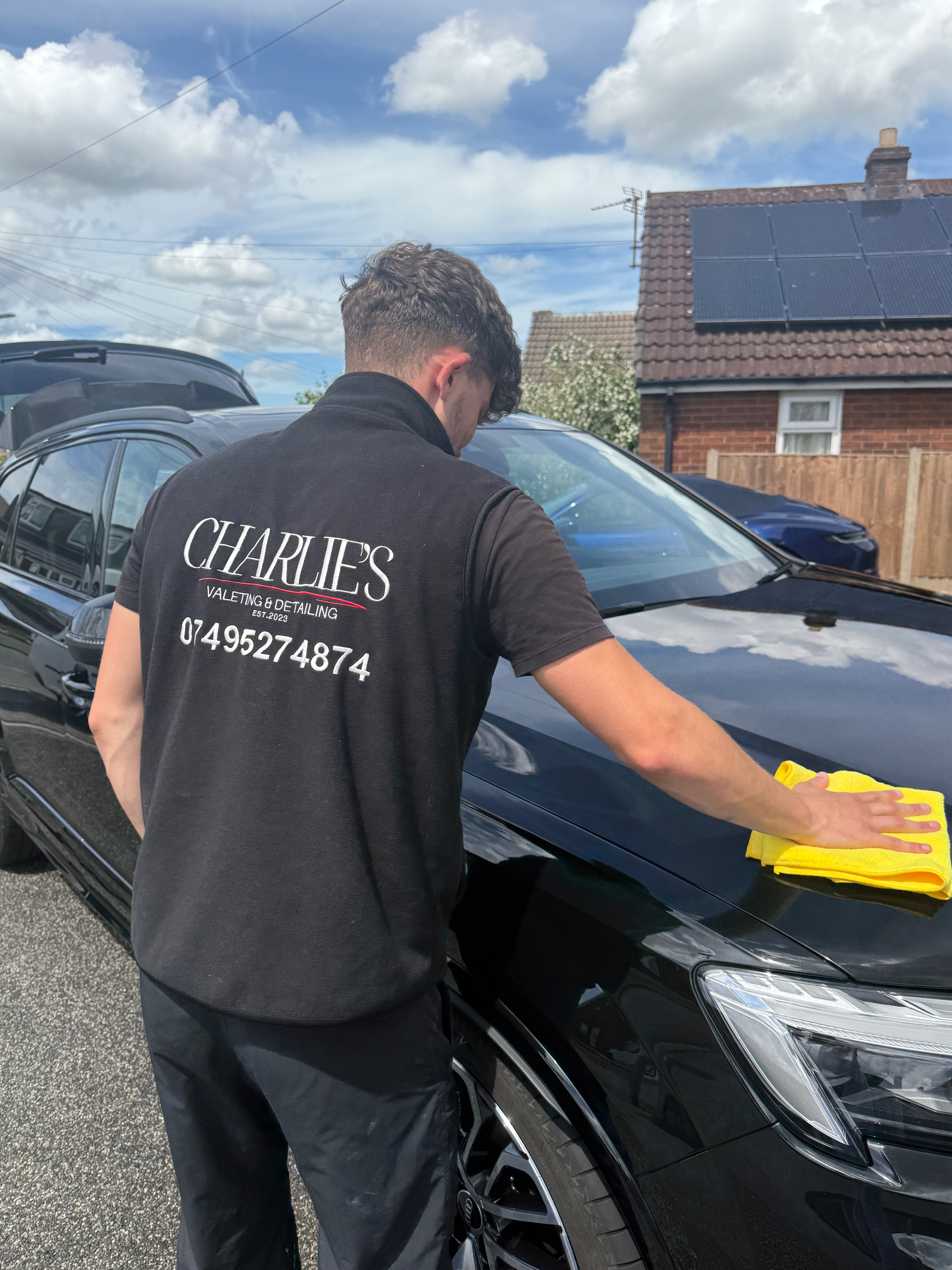 Charlie detailing a vehicle